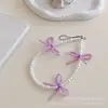 Novo Pulseira de Contas Borboleta com Glitter Corrente de Celular de Nicho Pulseira de Laço Anti-Perda Pingente para Mochila Conjunto de Fones de Ouvido