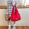 Bolso Cubo Casual de Gran Capacidad Estilo Coreano para Mujer Primavera 2026 Nuevo Bolso de Hombro Simple de Tela de Nylon Bolso de Compras
