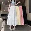 Falda de pastel blanca, falda de paraguas para mujer, nuevo estilo de verano, fluida, falda plisada que cubre la cadera, falda larga de línea A, falda de longitud media para petite