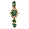 Nuevo Reloj Pulsera Lingote Portador de Riqueza Incrustado con Diamantes Ovalados y Piedras Preciosas de Colores con un Toque de Lujo y Elegancia, Popular Reloj para Mujer de Comercio Exterior