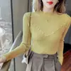 Camiseta base de punto con cuentas y cuello semi-alto OEM para mujer, nuevo suéter elegante otoño e invierno 2026, tejido de punto ajustado