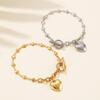 Collar y pulsera de acero inoxidable con forma de corazón y hebilla de temperamento europeo y americano con forma de rueda de tarjeta para mujer