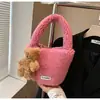 Mini Bolso de Felpa de Alta Gama Transfronterizo para Mujer Otoño e Invierno 2025 Nuevo Popular Bolso Cubo Cruzado de Mano de Felpa