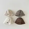 Gorro de bebé de Corea del Sur 2024, nuevo gorro de lavabo a juego con cordones para bebé, gorro de pescador para niño.