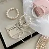 Colar de Pérolas de Vidro Suave e Elegante para Mulheres, Novo Estilo Popular de 2026, Corrente de Clavícula de Alta Qualidade, Corrente de Pescoço de Nicho de Luxo Leve