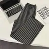 Pantalones de pijama de verano para mujer, pantalones largos, pantalones casuales de seda helada acanalados a rayas, versátiles y ligeros, adecuados para usar al aire libre, pantalones de seda para casa