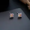 Brincos Cluster de Diamante Cheio de Novo Estilo Transfronteiriços para Homens, Modernos e Versáteis, Brincos de Flor de Íris em Forma de Cruz de Alto Padrão para Mulheres