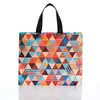 Bolsa de Mano para Manta de Hombro con Fondo y Lados Bolsa Cosmética Laminada Plegable Bolsa No Tejida Personalizada Venta al por Mayor