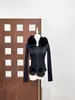 Sudadera con Capucha de Punto Bordada de Piel Sintética Estilo Nuevo Primavera París 2026 Conjunto de Leggings Estilo Americano Chica Picante