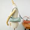 Bolsa de nylon leve feminina novo estilo coreano moda versátil lona bolsa feminina design de nicho simples portátil bolsa de ombro