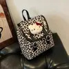 Mochila unisex de moda transfronteriza con estampado de leopardo y diseño de gatito de dibujos animados, mochila escolar para estudiantes, nuevo modelo 2026 mochila de viaje para niños
