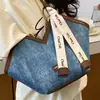 Bolso Tote de Mezclilla Retro de Gran Capacidad de Nicho Transfronterizo para Mujer 2026 Nuevo Versátil con Textura para Hombro de Viaje