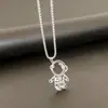 Collar de hombre de acero de titanio con diseño de astronauta, superventas europeo y americano transfronterizo, diseño tranquilo y elegante, moderno, combina con todo, mismo estilo de Amazon