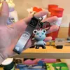 Llavero de oso de color de dibujos animados creativo, colgante de oso dragón con degradado de estrellas, colgante de bolso, máquina expendedora, regalo pequeño, venta al por mayor