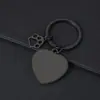 Llavero de Pata de Perro Hueca Transfronterizo Metal Forma de Corazón Impresión Láser Color Material en Blanco Regalo de Vacaciones Llavero Grabado