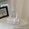 Bolsa Transversal de Grande Capacidade para Mulheres 2026 Novo Estilo Transfronteiriço Rebite Bolsa de Mão Hot Girl Moda para o Trabalho Versátil Bolsa Bowling