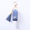 Funda de cuero sin desinfectante de manos de PU, llavero con borla para spray, botella vacía de spray de perfume desinfectante, llavero de funda de cuero