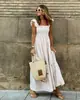 2024 Estação Independente Amazon Roupas Femininas de Verão Novas Europeias e Americanas Colagem Xadrez Vestido Casual Rodado com Suspensório para Mulheres
