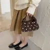 Bolso de lunares para debajo del brazo para mujer, nuevo bolso de mano chic estilo coreano de nicho para el otoño de 2026, bolso de hombro moderno para el trabajo y los desplazamientos