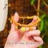 Pu Zuojiu não desbota na cor, ouro, deus amarelo da riqueza, engolindo besta de ouro, pulseira enrolada, pulseira feminina estilo nacional chinês novo para namorada