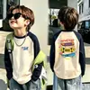 Camiseta base de forro polar alemán de doble cara para niño otoño e invierno estilo coreano prenda superior camiseta base capa interior cuello redondo bloques de color de dibujos animados manga larga