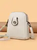 Bolso para teléfono móvil de mujer, nuevo modelo de primavera, bolso pequeño de cuero PU suave con patrón de lichi, bolso pequeño vertical multicapa, bolso de hombro cruzado para mujer, moderno