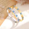 Nova pulseira de olho de diabo em aço titânio transfronteiriça europeia e americana, banhada a ouro 18K, de nicho, versátil e não desbota