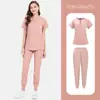 Conjunto de Uniforme Quirúrgico de Color Sólido de Dos Piezas con Cuello Abierto y Media Cremallera Uniforme de Trabajo Hospitalario Uniforme de Enfermera Multicolor Venta al por Mayor