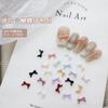 Mini lazo para decoración de uñas, accesorios populares de Internet, estilo francés, pajarita pequeña, color, tamaño, colores mixtos, resina, diamante, accesorios para armaduras.