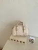 Bolso de mano de moda de alta gama para mujer estilo bowling, nuevo bolso de hombro cruzado estilo coreano simple y elegante 2026