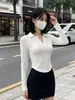 Camiseta de manga larga con dobladillo en forma de U para mujer, diseño de otoño e invierno, ajustada, sexy, top de chica hot, camisa base corta con cuello polo para mujer