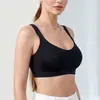 Sujetador inalámbrico sin costuras de venta caliente transfronterizo tirantes anchos recogen grasa de las axilas copa grande lencería venta al por mayor tienda física nacional múltiples colores