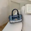 Bolsa Boston fofa estilo coreano com laço, bolsa de mão de bolinhas de nicho, moderna e na moda, bolsa de ombro fresca e doce