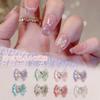 Uñas de arco de guerrera de belleza neta roja Joyería Super Flash Joker tridimensional Aurora amor accesorios para uñas al por mayor