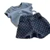 Conjunto de Ropa de Verano de Moda Coreana para Niñas 2026 Nuevo Estilo Camiseta Casual de Manga Corta con Lunares y Shorts de Mezclilla para Niños