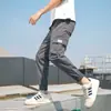 Pantalones Cargo para Hombre Primavera y Otoño 2021 Nuevo Estilo Sueltos Casuales Joggers Marca de Moda Pantalones Cropped Versión Coreana con Forro Polar
