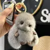 Colgante de bolso de conejo de peluche, pelo sintético de visón, accesorio llavero de coche de conejo de orejas grandes, lindo juguete de peluche