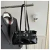 Bolsa tote feminina vintage de comércio exterior transfronteiriço 2026 de grande capacidade, nova moda, com fivela de cinto e rebites, adequada para uso na mão ou no ombro