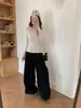 Chica picante primavera y otoño estilo coreano cuello en V manga larga empalme de encaje corte ajustado color liso diseño de nicho camiseta base camiseta simple