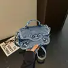 Bolsa Jeans Lavado Bolsa para Motocicleta Feminina 2026 Nova Leve Versátil Bolsa Transversal Pequena Quadrada de Mão para Uso Externo