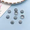 10 aleación de plata antigua hueca soporte para flores tapa de flor Yiwu accesorios cuenta espaciadora de pulsera soporte materiales para accesorios de joyería DIY