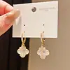 Zirconia Estilo Lujo Ligero Flor de Trébol de Cuatro Hojas Brazaletes de Oreja de Cristal Exquisitos Modernos Versátiles Pendientes Nicho de Alta Gama Adornos para Orejas para Mujeres