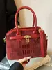 Bolsos de mano de alta gama para mujer, primavera 2026, nuevo estilo, bolsos versátiles, modernos, de nicho, texturizados, con bordado de letras, bolso de hombro