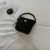 Bolso de mano de alto estilo retro 2026 nuevo de moda personalizado casual sensación relajada bolso de hombro cruzado