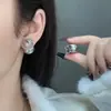 Delantero y trasero para usar nuevo popular trébol de cuatro hojas perla hebilla de oreja de plata diseño de nicho retro pendientes versátiles Pendientes elegantes