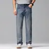 Shanggu Moda Masculina Verão Fresco Seda Gelada Lyocell Homens de Negócios Reta Casual Jeans Vintage Lavado