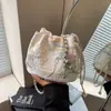 Bolso Pequeño de Verano para Mujer 2025 Nueva Moda Nuevo Estilo Chino Casual Bolso Cubo Nicho Simple Personalizado Bolso Cruzado
