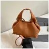 Bolso altamente elegante y único 2026 nueva moda bolso nube relajado nicho moderno color sólido plisado bolso cruzado