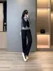 Conjunto Esportivo Casual de Moda de Alta Qualidade para Mulheres Outono Novo Colete de Gola Redonda Falso Duas Peças Blusa de Manga Longa e Calças Conjunto de Duas Peças