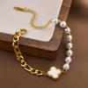 Pulsera de trébol de perla que no se desvanece de acero de titanio para mujer estilo coreano versátil moda pulsera popular nicho conjunto pulsera de pareja